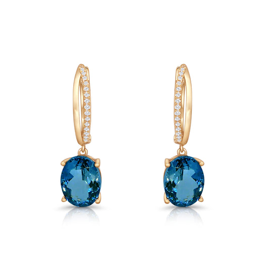 the Stone Sparkle Earrings - 18K Gold Plated Sterling Silver with London Blue Topaz